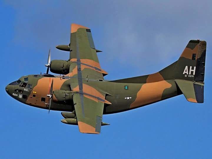 plane flying with blue sky in background